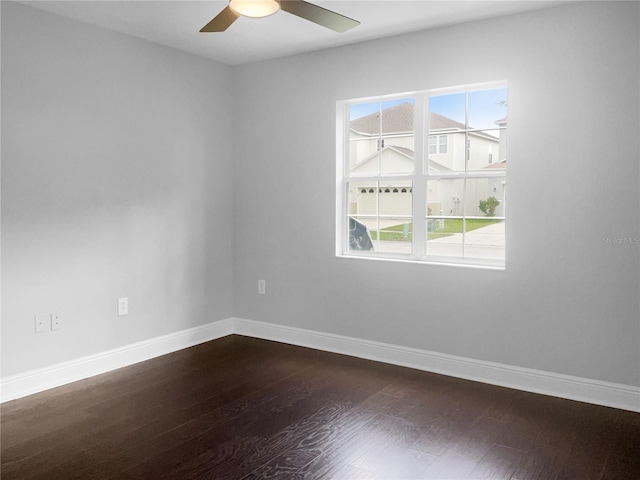 spare room featuring ceiling fan and hardwood / wood-style flooring