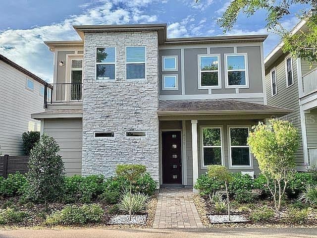 view of front of house featuring stone siding