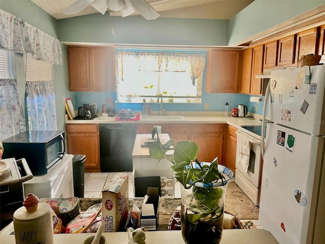 kitchen with sink, ceiling fan, white appliances, and light tile patterned floors