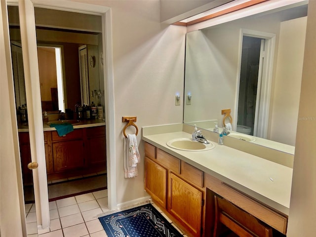 bathroom featuring vanity and tile patterned flooring