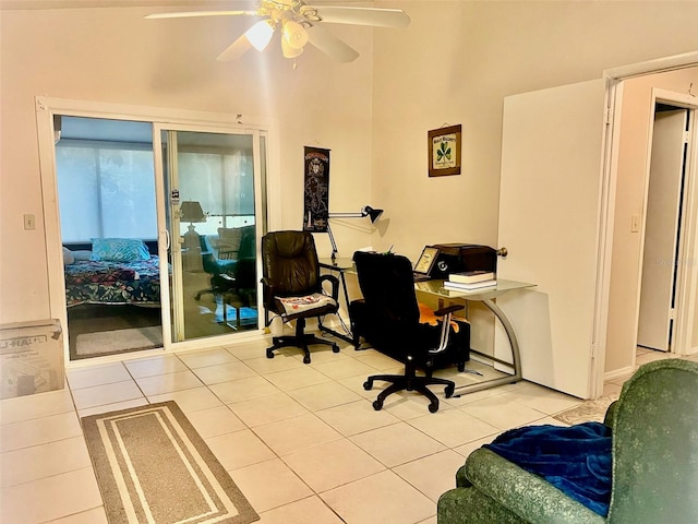 office with light tile patterned floors and ceiling fan