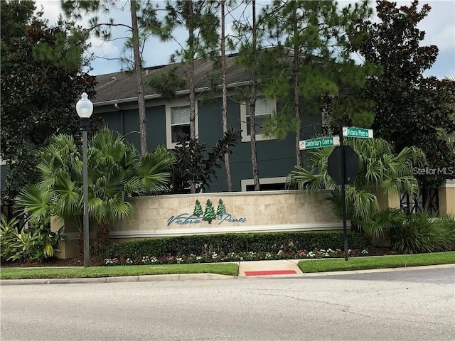 view of community sign