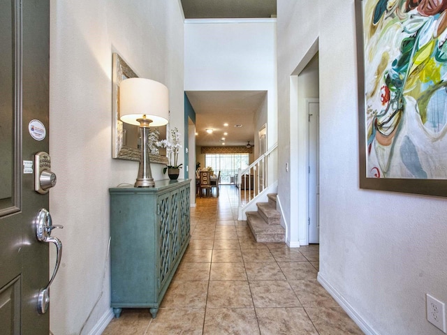 hallway with light tile patterned floors