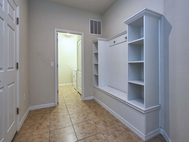 mudroom featuring light tile patterned floors