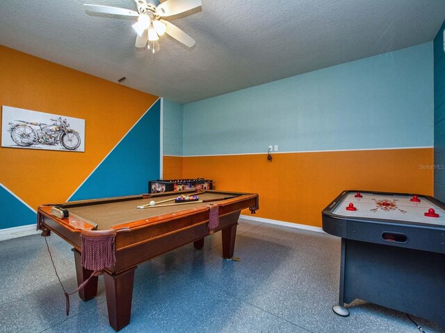 playroom featuring a textured ceiling, ceiling fan, and billiards