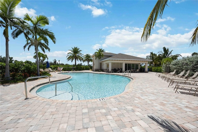 pool featuring a patio area