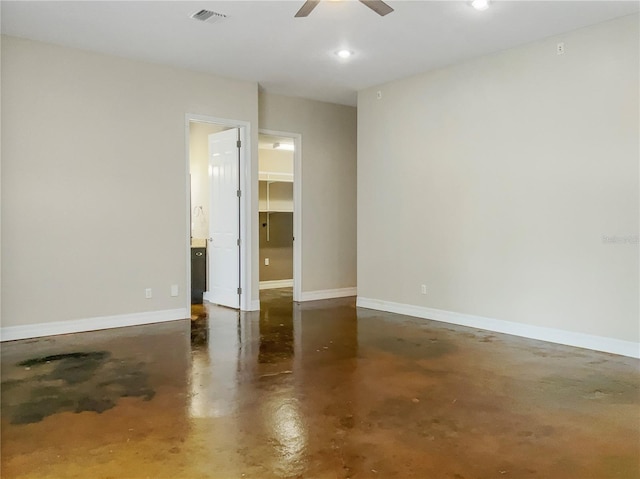 spare room with ceiling fan