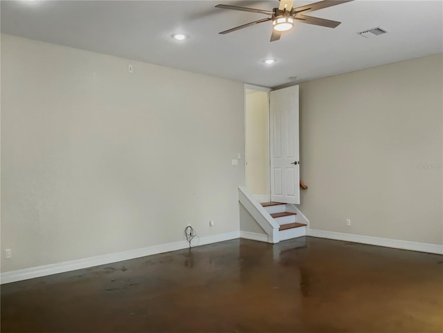 spare room with ceiling fan