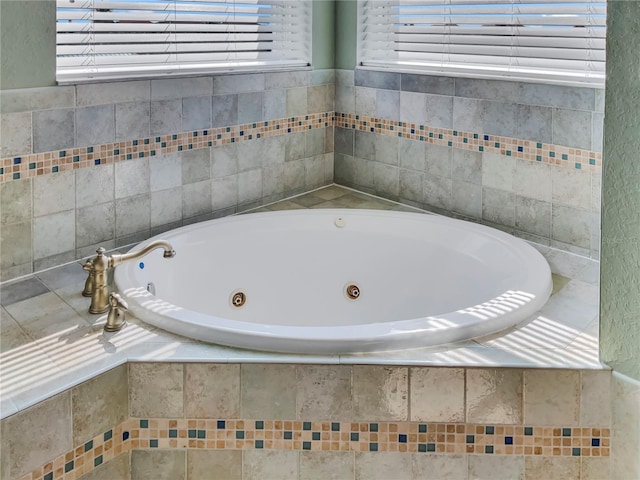 bathroom with tiled tub