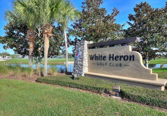 333 Navarra Ln, Davenport, FL 33837 - community / neighborhood sign featuring a yard and a water view