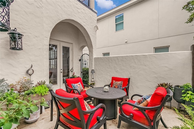 view of patio featuring french doors