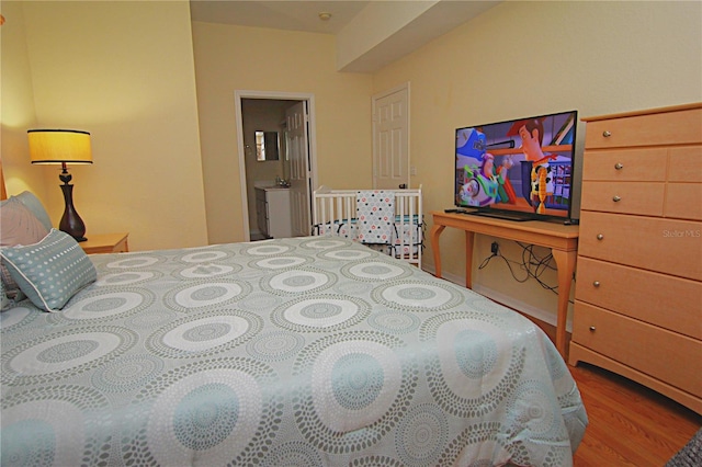 bedroom with wood-type flooring