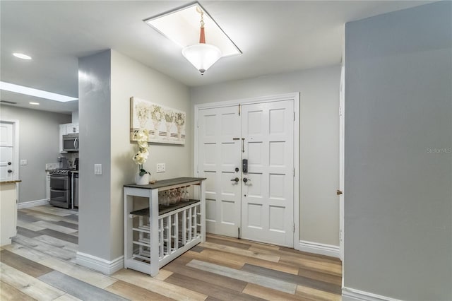 foyer featuring light hardwood / wood-style floors