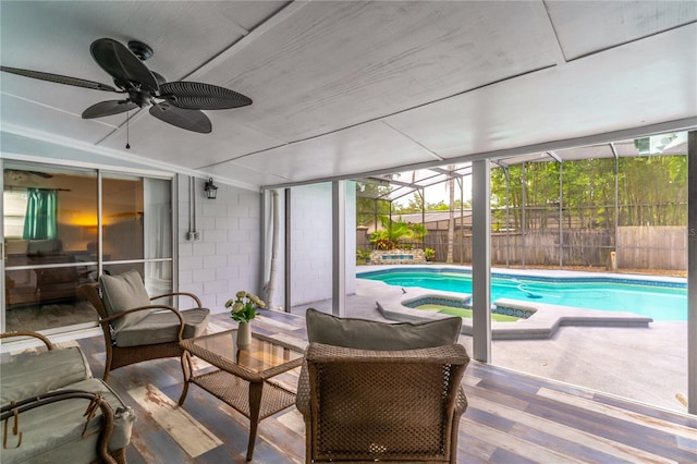 view of swimming pool with ceiling fan