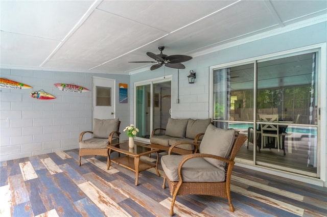 deck with ceiling fan and outdoor lounge area