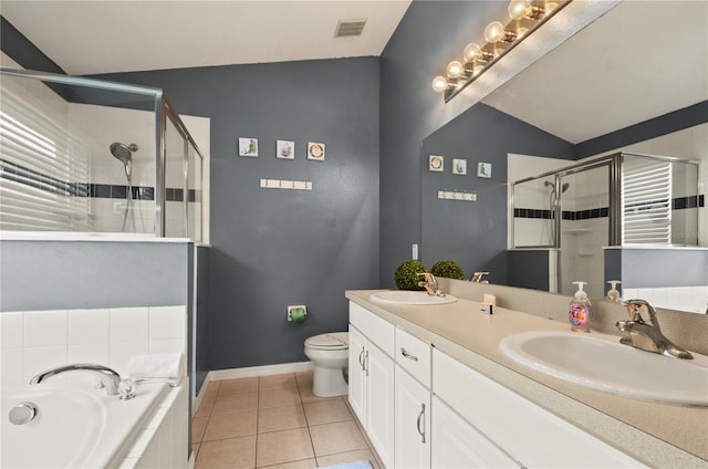 full bathroom with shower with separate bathtub, dual vanity, toilet, lofted ceiling, and tile patterned flooring