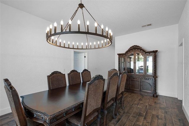 dining area with dark hardwood / wood-style flooring