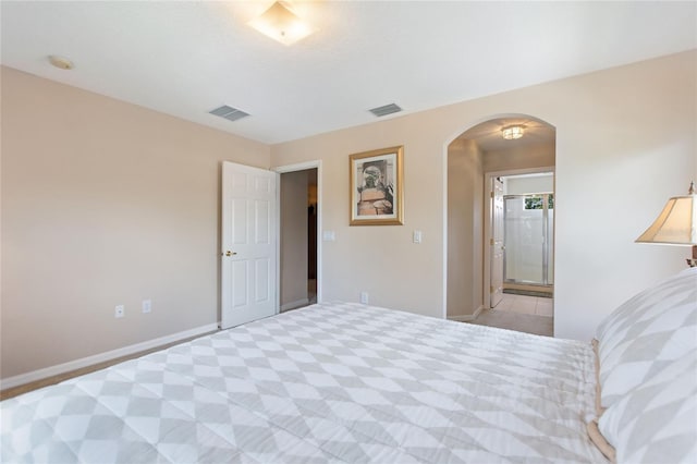 bedroom with ensuite bath