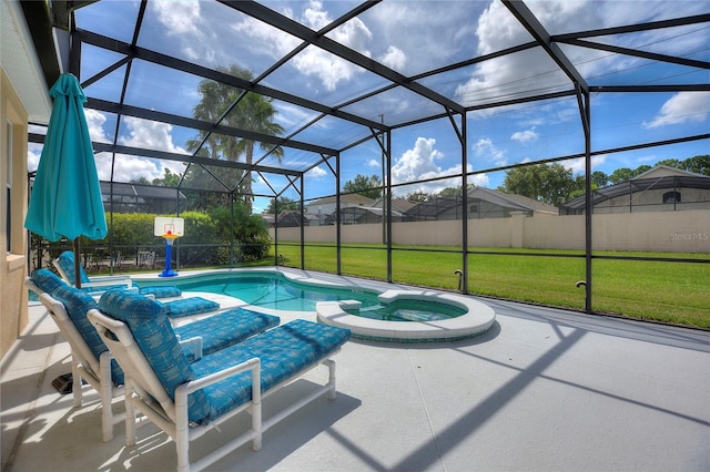 view of swimming pool with an in ground hot tub, a lanai, a yard, and a patio area