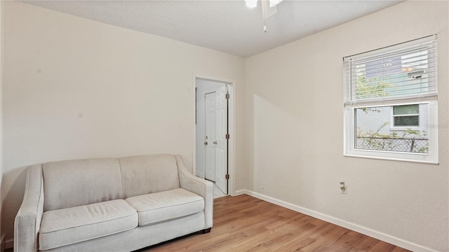 sitting room with light hardwood / wood-style floors