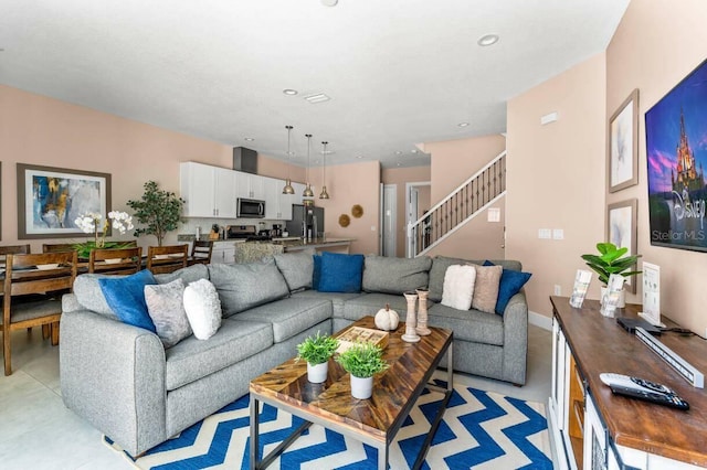 living room featuring light tile patterned floors