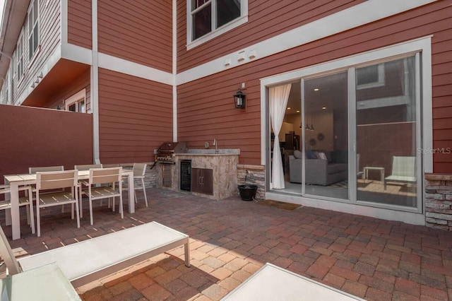 view of patio featuring grilling area and an outdoor kitchen