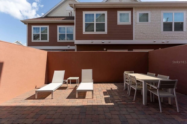 rear view of property with a patio area