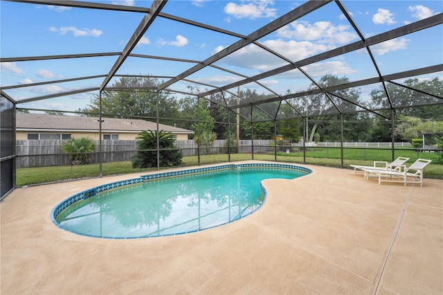 view of swimming pool featuring a fenced backyard, a lanai, a lawn, a fenced in pool, and a patio area