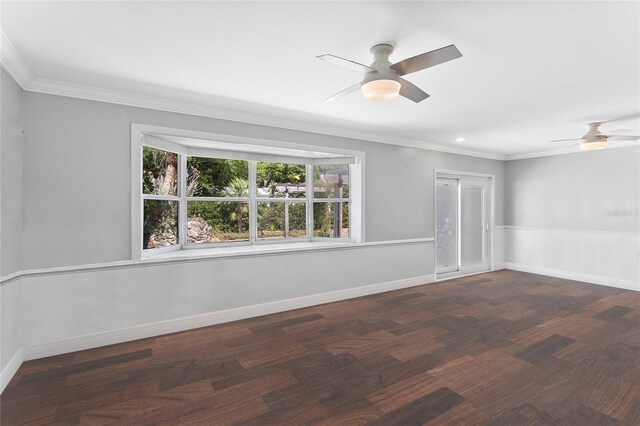 unfurnished room featuring ornamental molding, dark hardwood / wood-style flooring, and ceiling fan