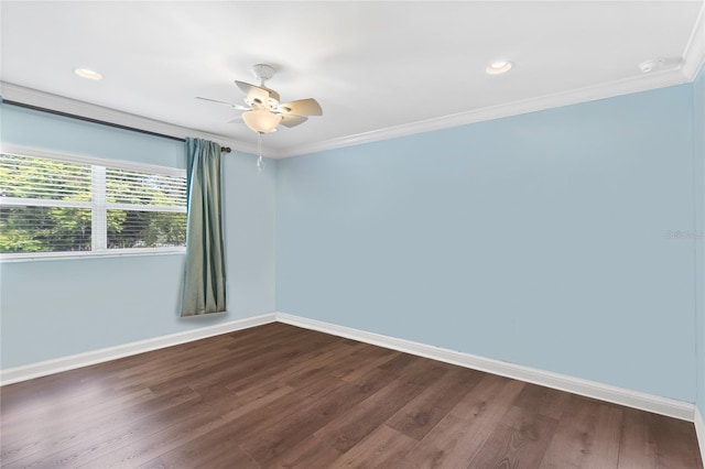 unfurnished room featuring dark hardwood / wood-style floors, crown molding, and ceiling fan