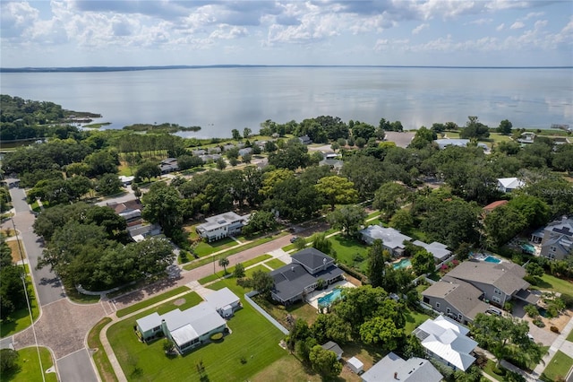 drone / aerial view with a water view