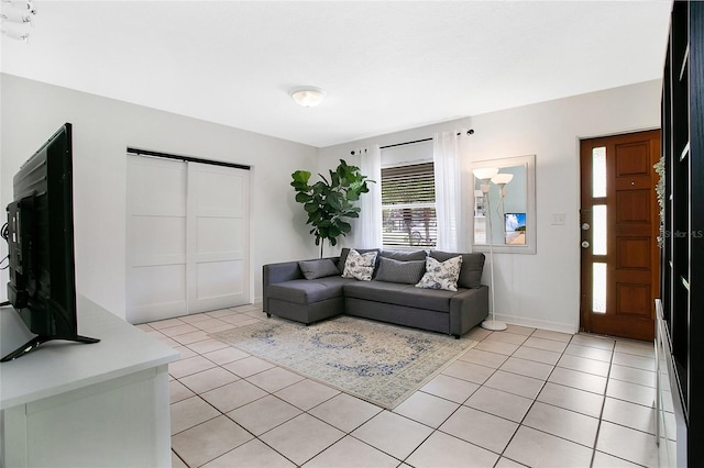 living room featuring light tile patterned floors