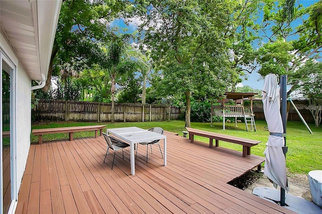 deck featuring a yard