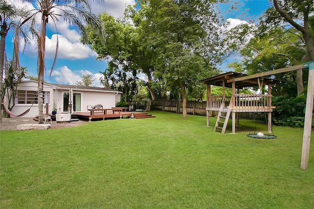 view of yard with a wooden deck