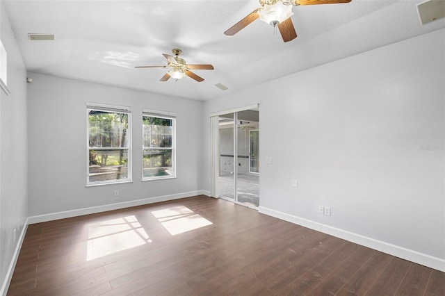 unfurnished room featuring ceiling fan and dark hardwood / wood-style floors