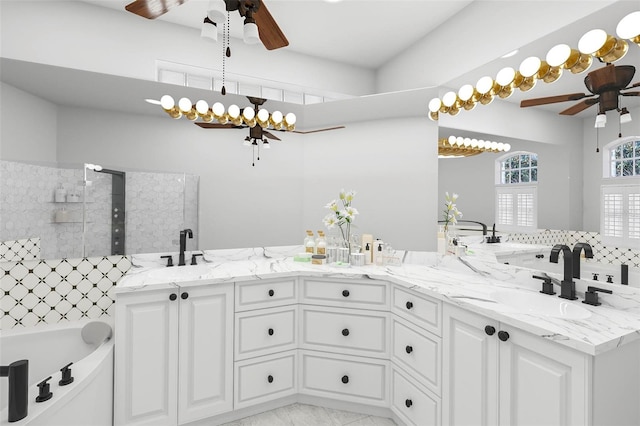 bathroom featuring ceiling fan, separate shower and tub, and vanity