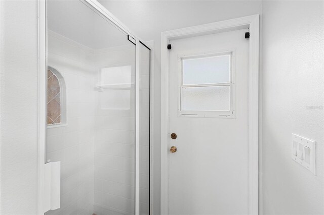 bathroom with an enclosed shower