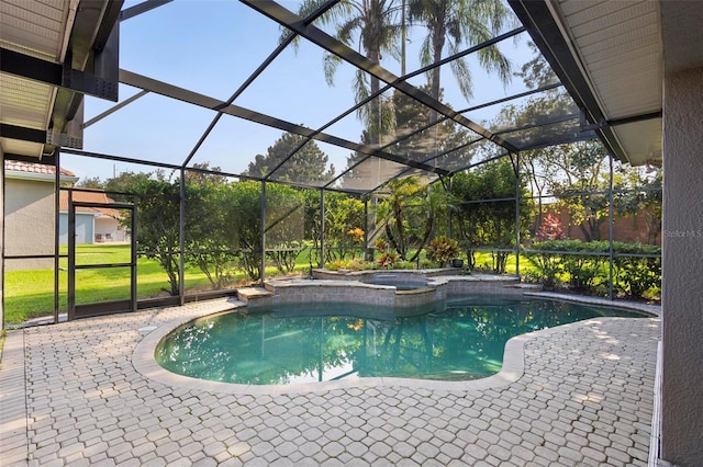 view of pool featuring a lanai, an in ground hot tub, and a patio