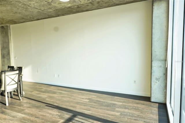 spare room featuring dark hardwood / wood-style floors