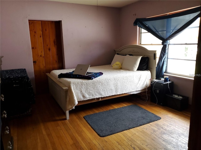 bedroom featuring hardwood / wood-style floors