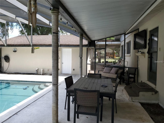 view of pool featuring a patio and a lanai