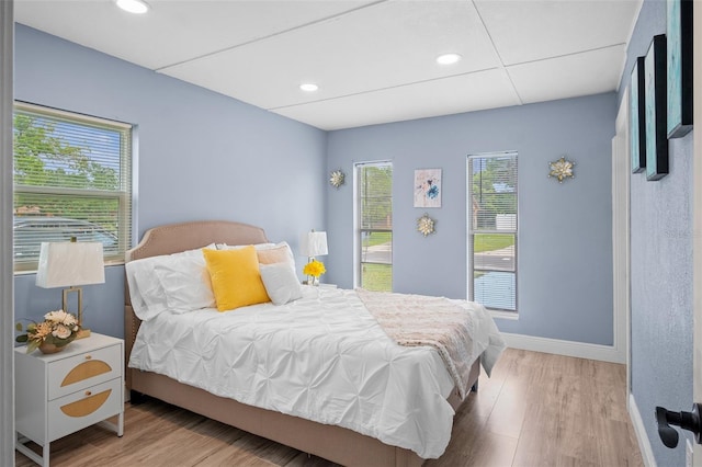 bedroom with light wood-type flooring