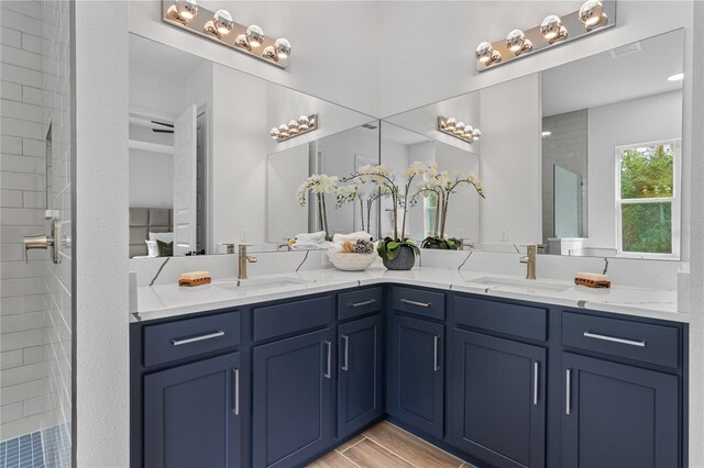 bathroom featuring dual vanity