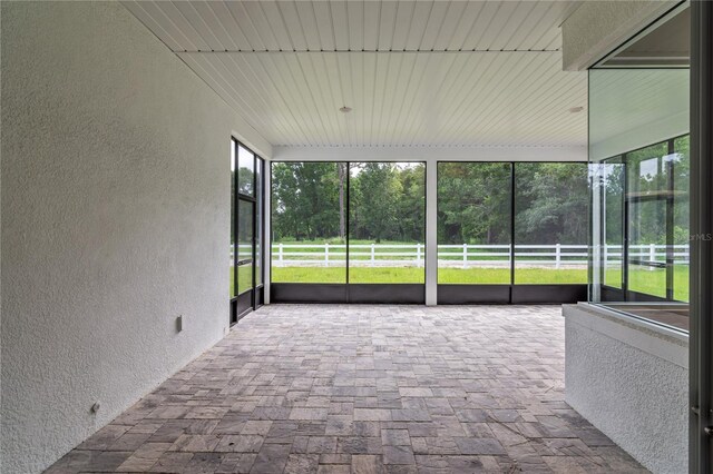 view of unfurnished sunroom