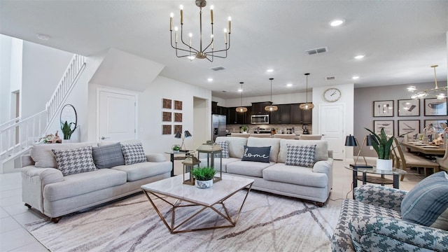 tiled living room featuring a notable chandelier