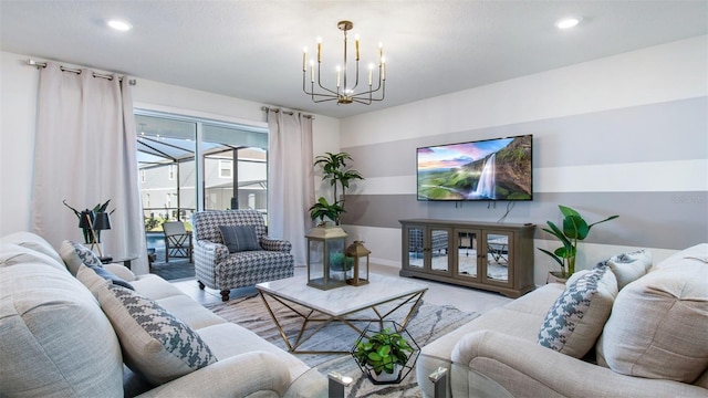 living room with a notable chandelier