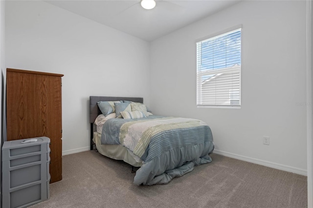 bedroom with light colored carpet