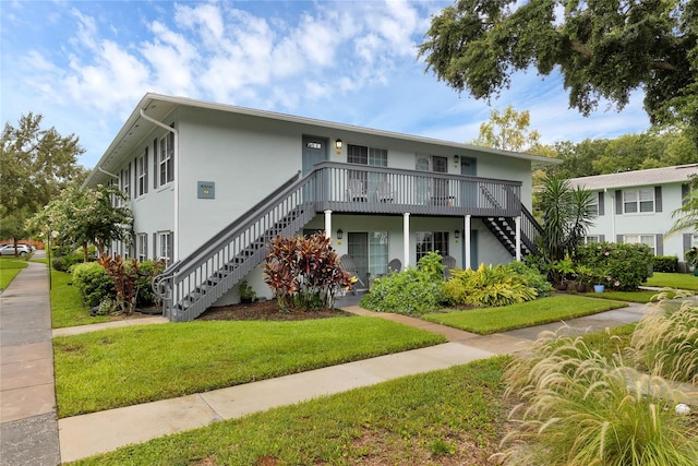 view of front of property with a front lawn