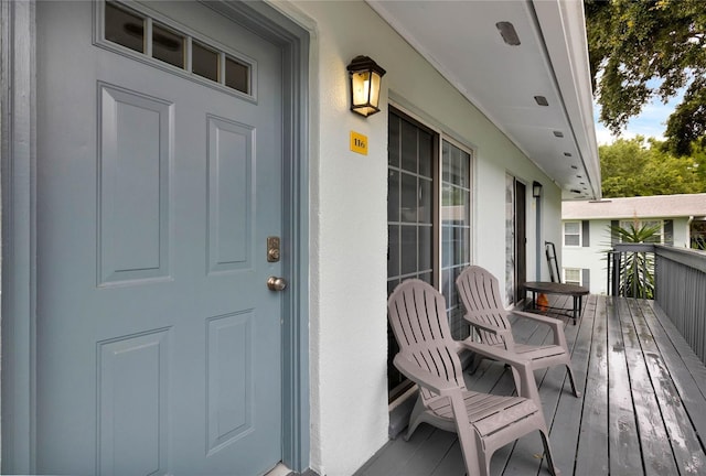 doorway to property featuring a porch