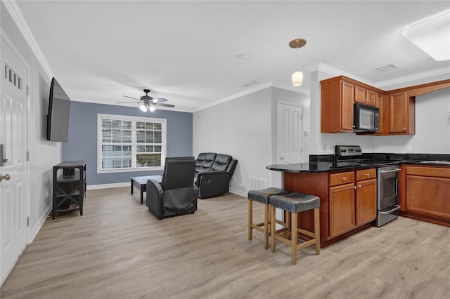 kitchen with a kitchen bar, decorative light fixtures, electric range, light hardwood / wood-style flooring, and ornamental molding